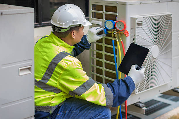 Professional Hvac technician working in Macon, MS